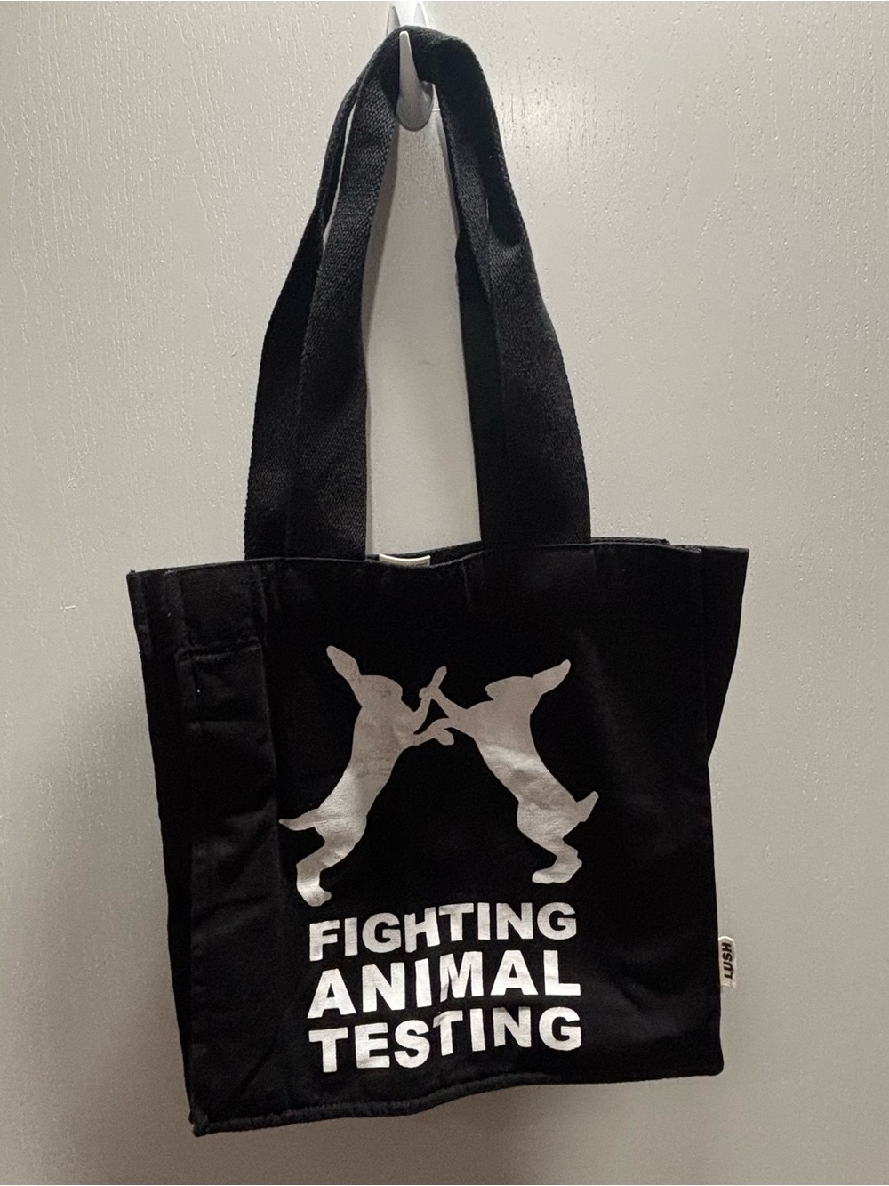 Black Lush Comsetics Protest Tote Bag with Silver Graphic